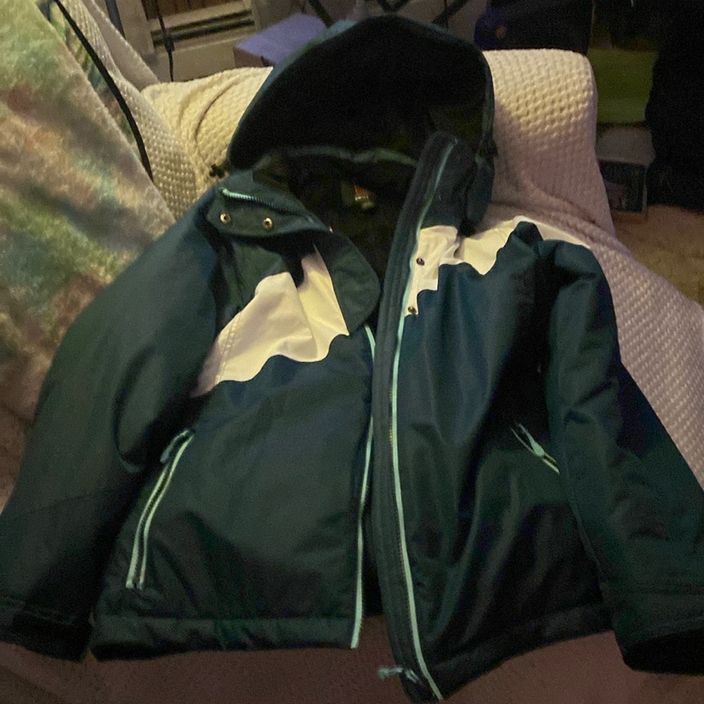 Swiss Tech performance gear with peak technology, waterproof snowboard jacket